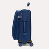 Blue suitcase with black wheels on a white background
