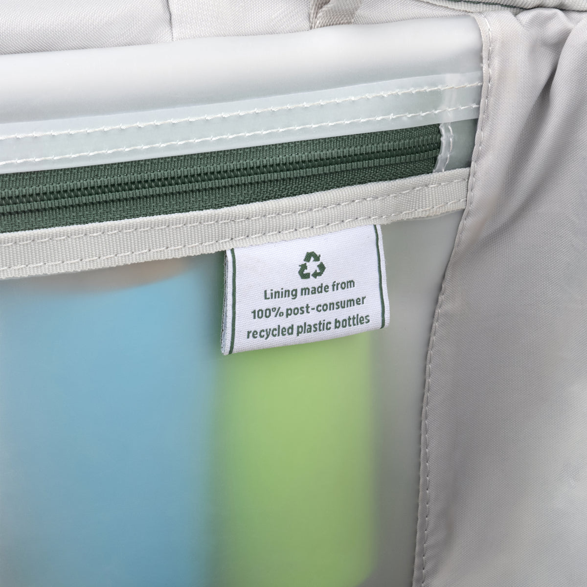 Label on a product indicating lining made from 100% post-consumer recycled plastic bottles.