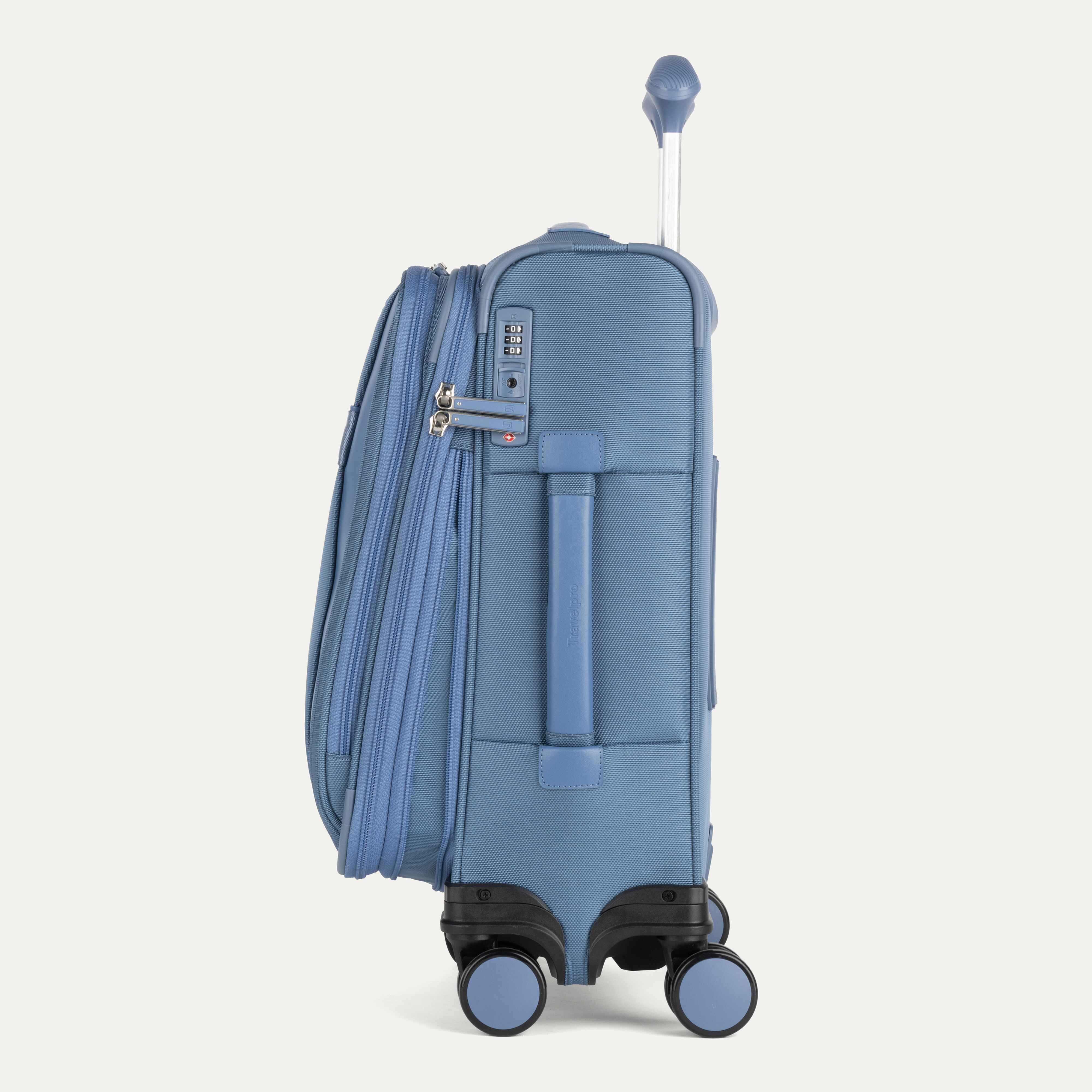Blue suitcase with black wheels on a white background