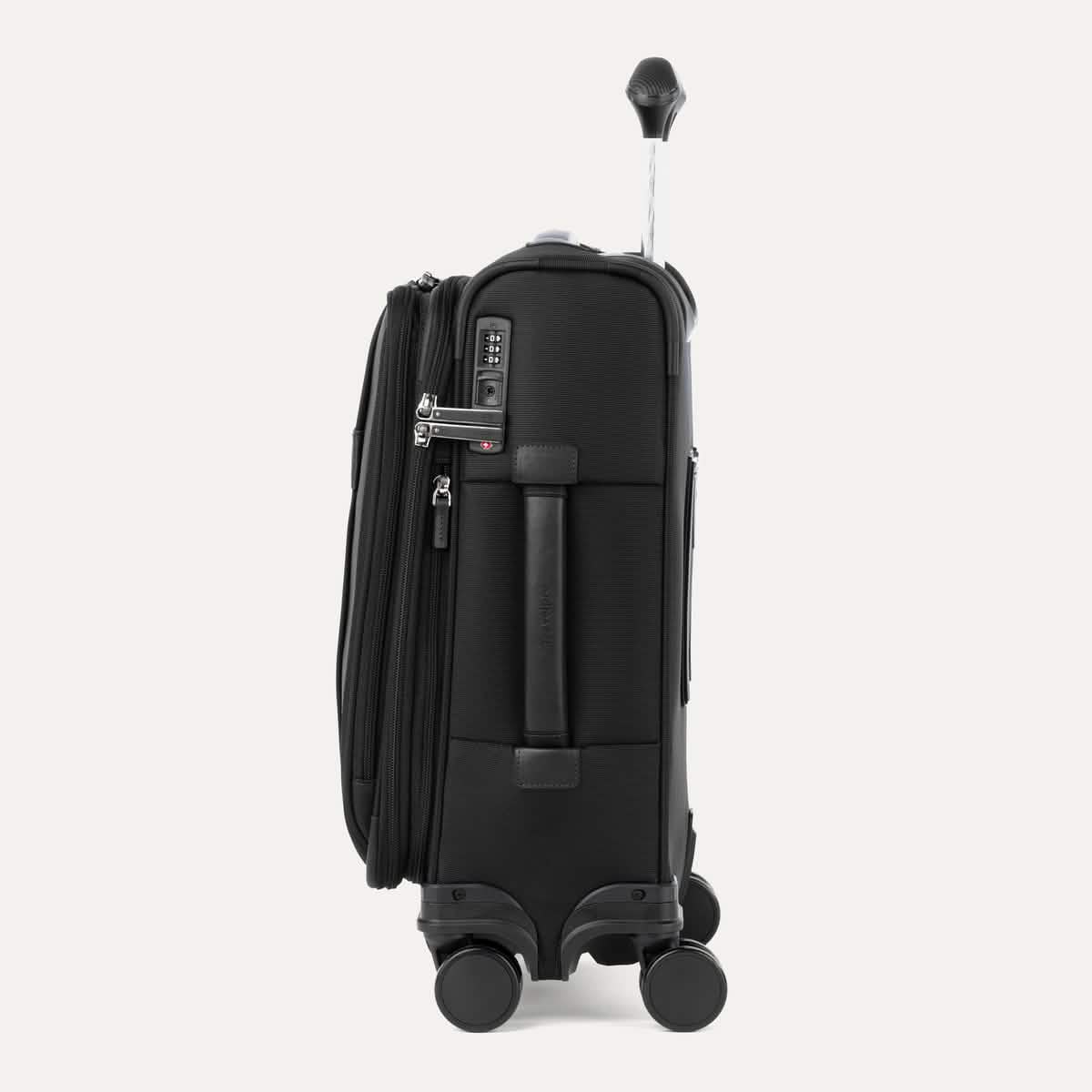 Side view of Travelpro VersaPack®+ Compact Carry-On Spinner in Black, featuring an expandable zipper, TSA-approved lock, and padded side carry handle with extended handle.