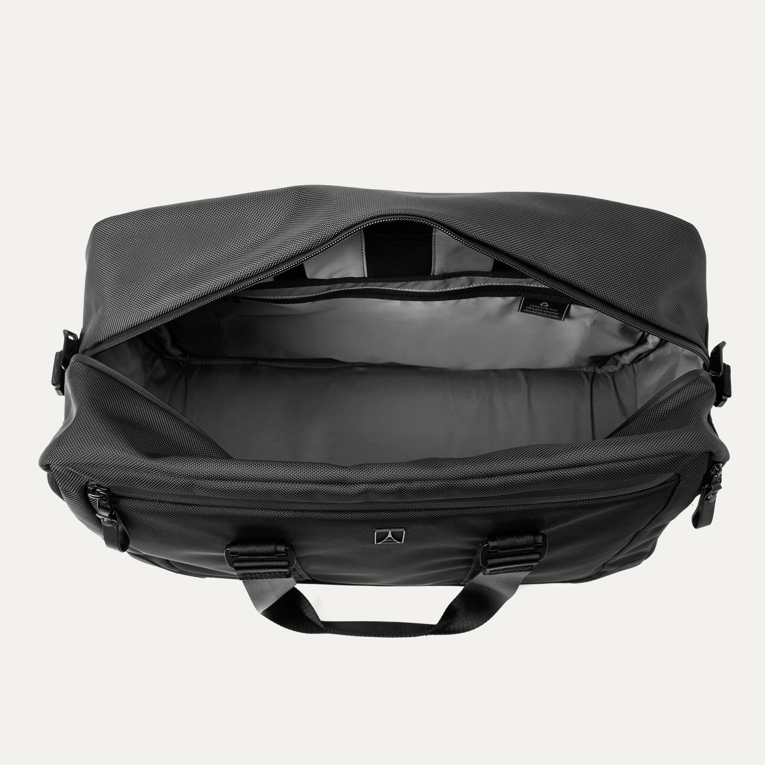 Top view of Travelpro Altitude Double Expansion Duffel in Jet Black with open main compartment and visible interior pockets.