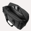 Slanted top view of Travelpro Altitude Double Expansion Duffel in Jet Black with open main compartment and interior pockets.