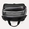Top view of the rear compartment of the Travelpro® Altitude™ Full Expansion Brief in black, open to reveal a padded laptop sleeve, a zippered pocket, and multiple organizational slots for documents and accessories.