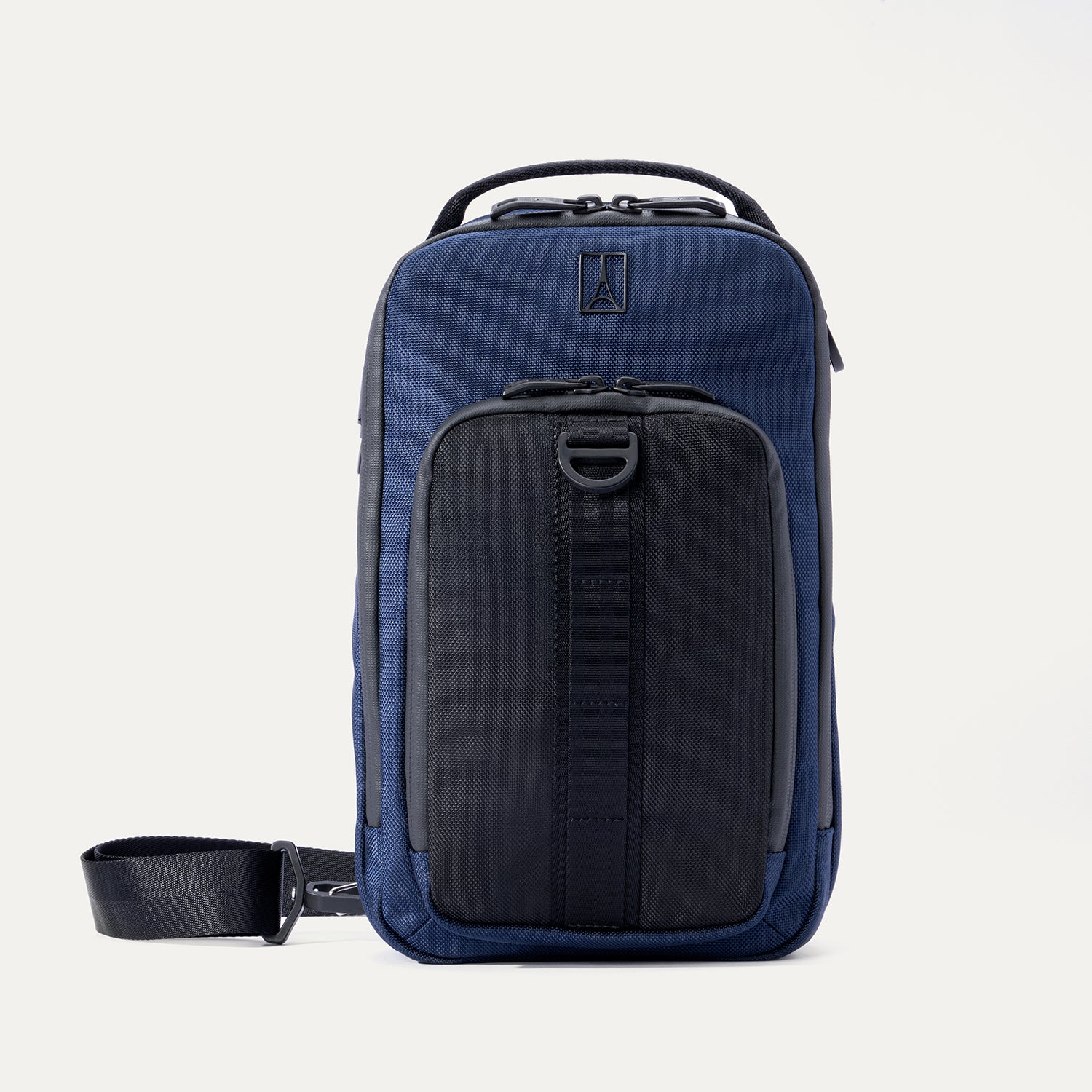 Front view of Travelpro Altitude Crossbody 6L in Aviator Navy, featuring exterior pocket with daisy chain and top carry handle.