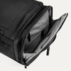Open side compartment of the Travelpro Altitude Convertible Duffel/Backpack in Jet Black, revealing interior storage for accessories or gear.