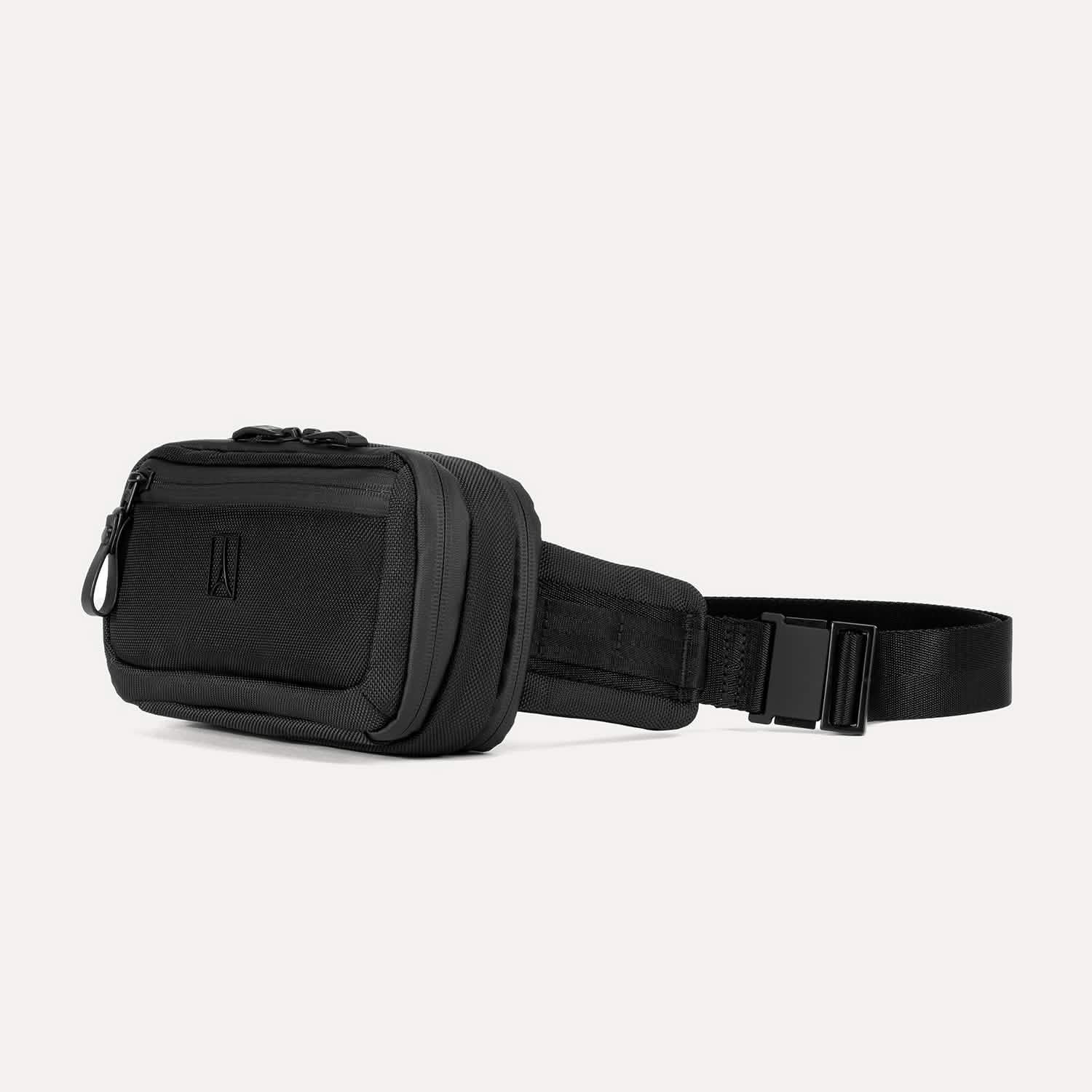 Travelpro Altitude Sling 2L in Jet Black, featuring an exterior zip pocket and adjustable waist strap.