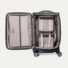 Interior view of the Travelpro Platinum Elite Carry-On Spinner in Camouflage, featuring mesh compartments and adjustable compression straps.