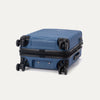Bottom view of Travelpro Maxlite Air V2 Spinner in Ensign Blue, featuring 360° Spinner Wheels and low-profile bottom carry handle.