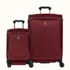 A set of two red spinner suitcases, one carry-on and one medium check-in size, with the travelpro logo on the front.