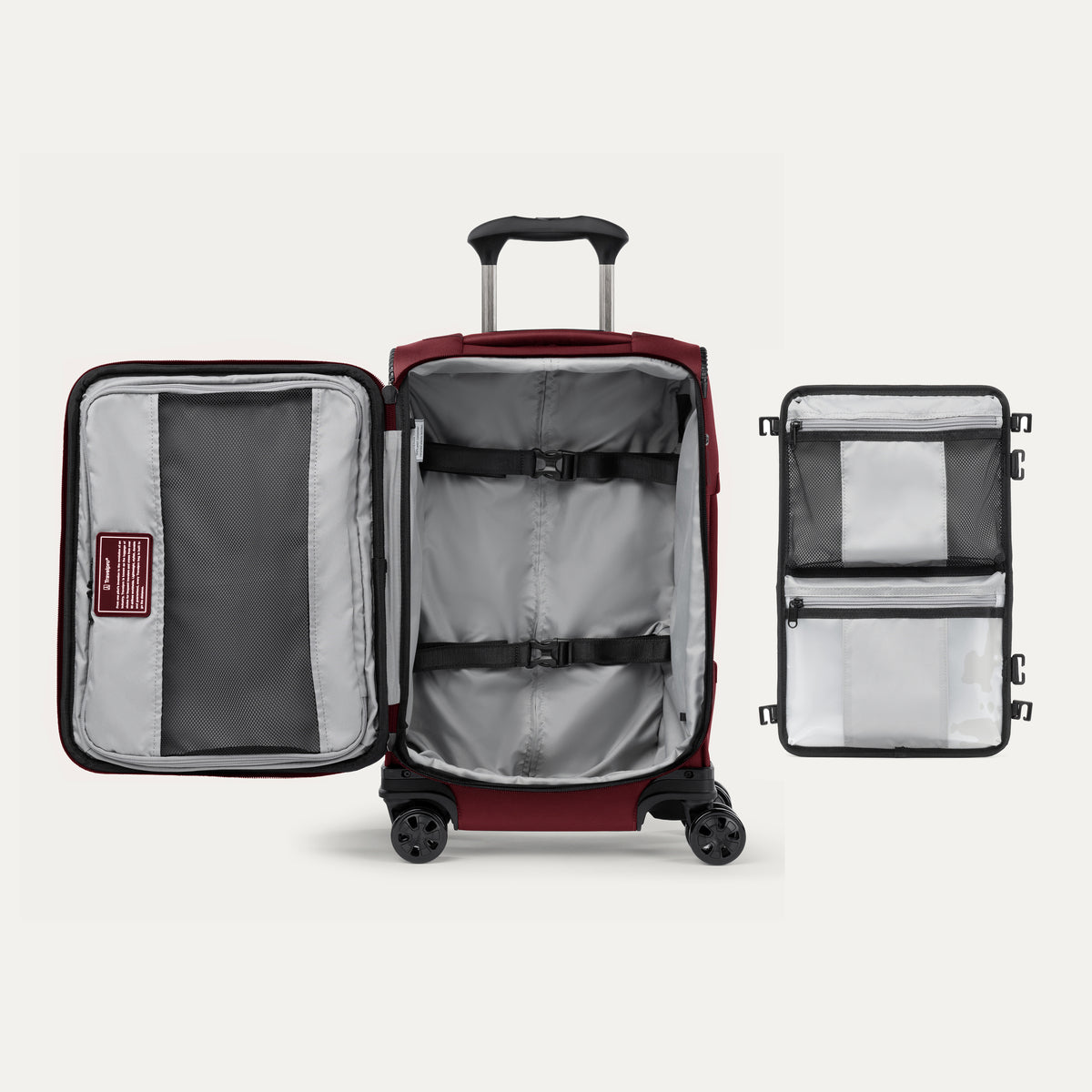 Open red suitcase featuring packing organizer on a white background