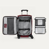 Open suitcase featuring packing organizer on a white background