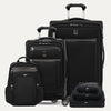 Set of black suitcases and backpack on a light gray background