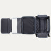 Open suitcase with compartments on a white background