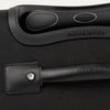 Close-up of a black suitcase handle and latch.