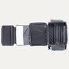 Open suitcase with compartments on a plain background