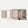 Open suitcase with unfolded compartment on a white background