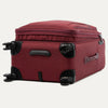 Red suitcase with black wheels on a white background