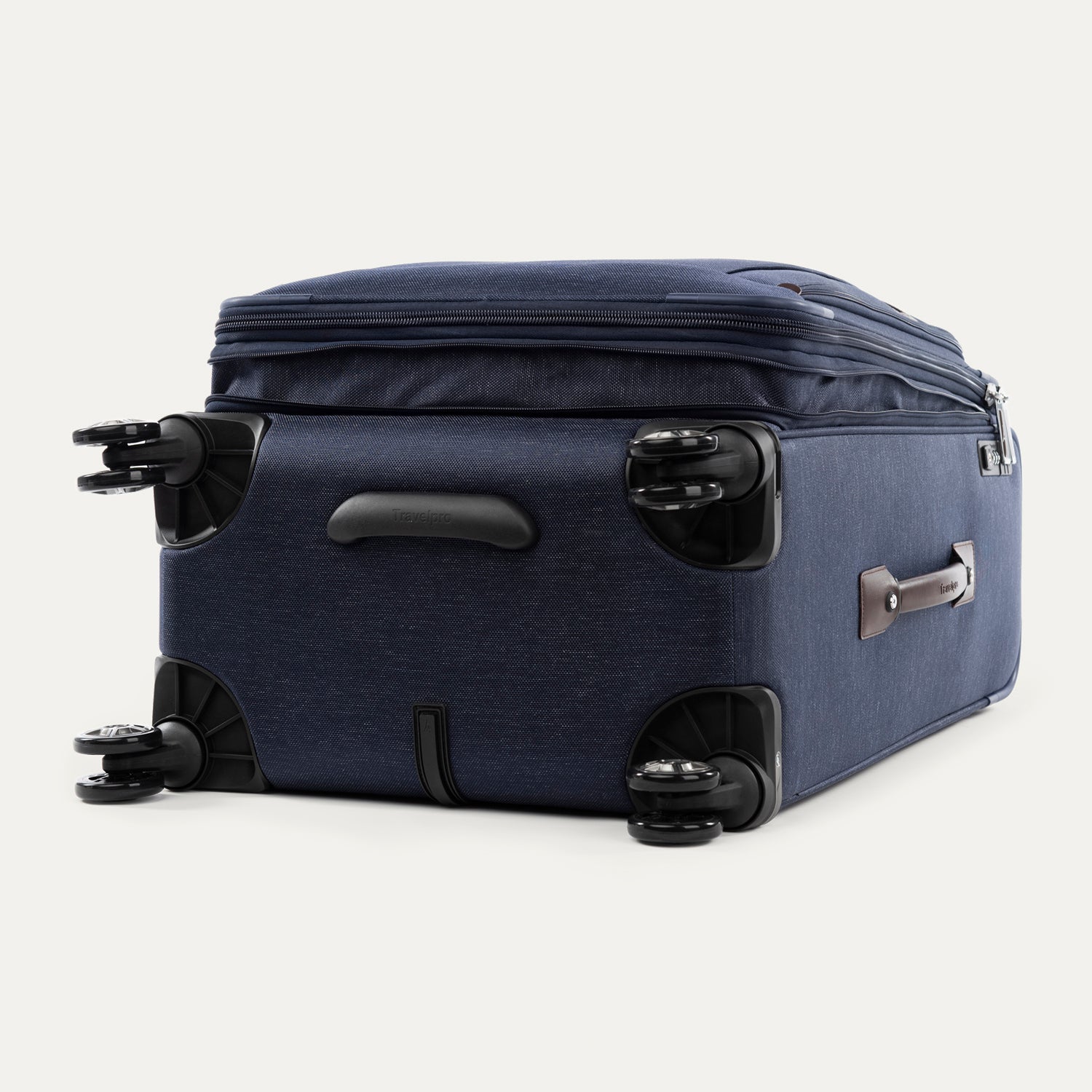 Blue suitcase with black wheels on a white background