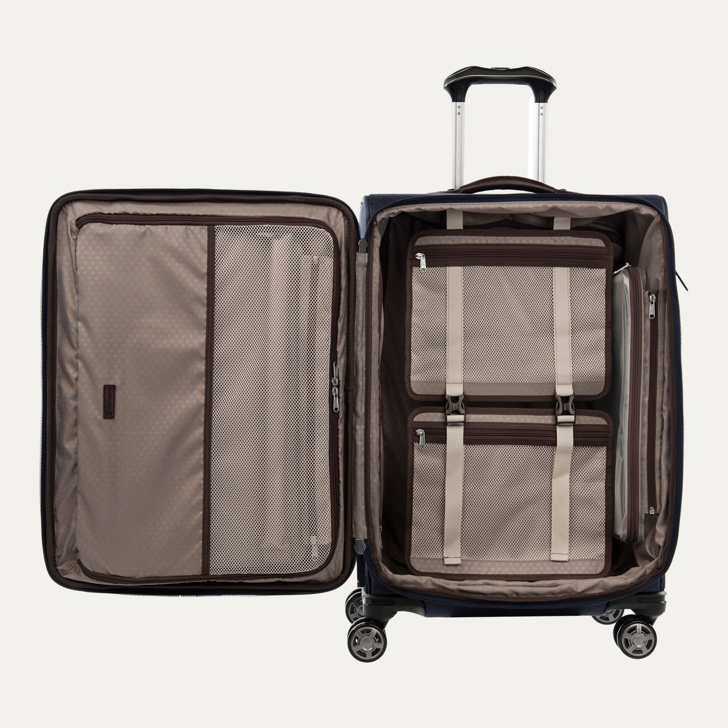 Open navy blue spinner luggage with telescopic handle, four wheels, and interior compartments including a fold-out suiter, pockets, and straps.