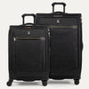 A set of two black suitcases with a spinner design, featuring the Travelpro logo on a white background