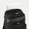 Black backpack with laptop visibly stored in the dedicated sleeve compartment.