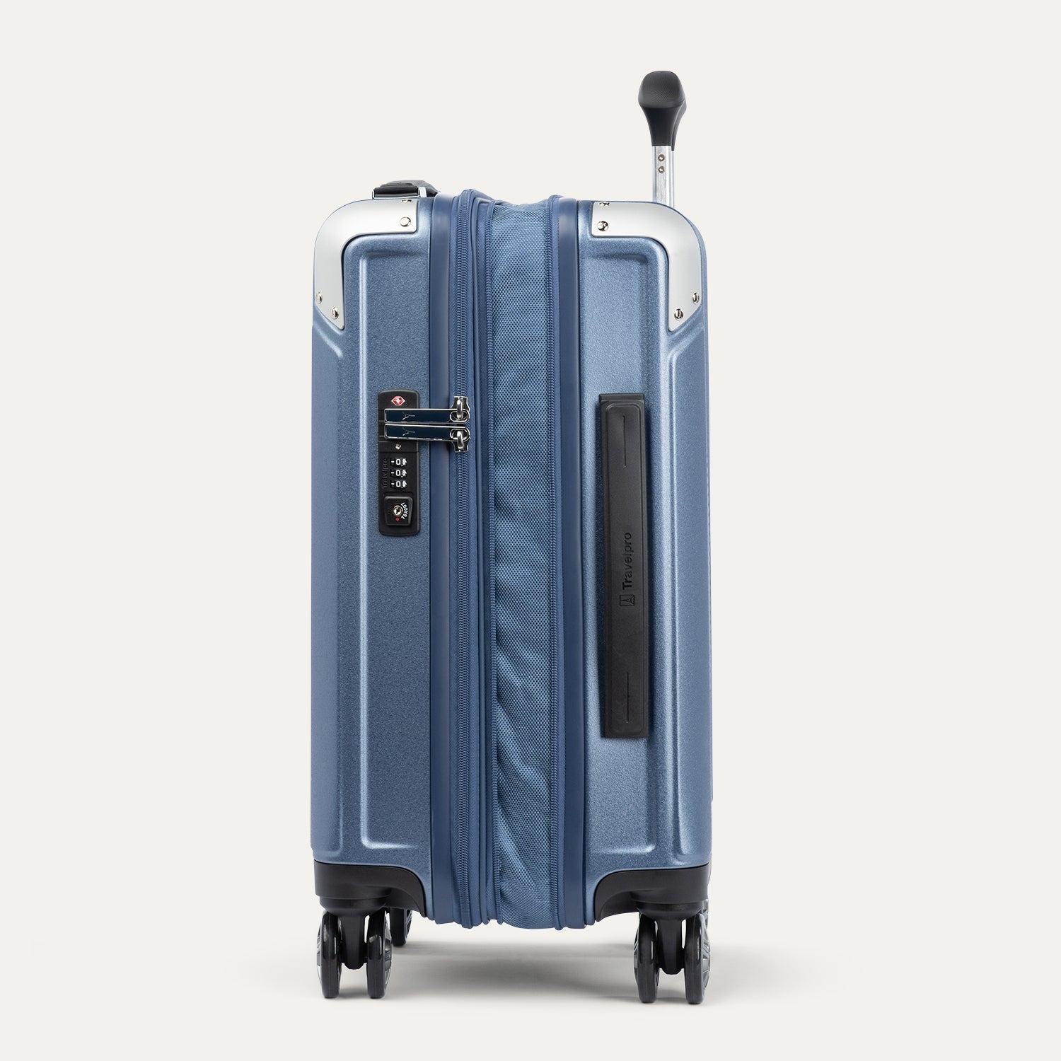 Side view of blue suitcase with a handle and wheels on a white background