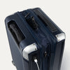 Navy blue suitcase with silver accents on a white background