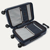 Open navy blue suitcase on a white background