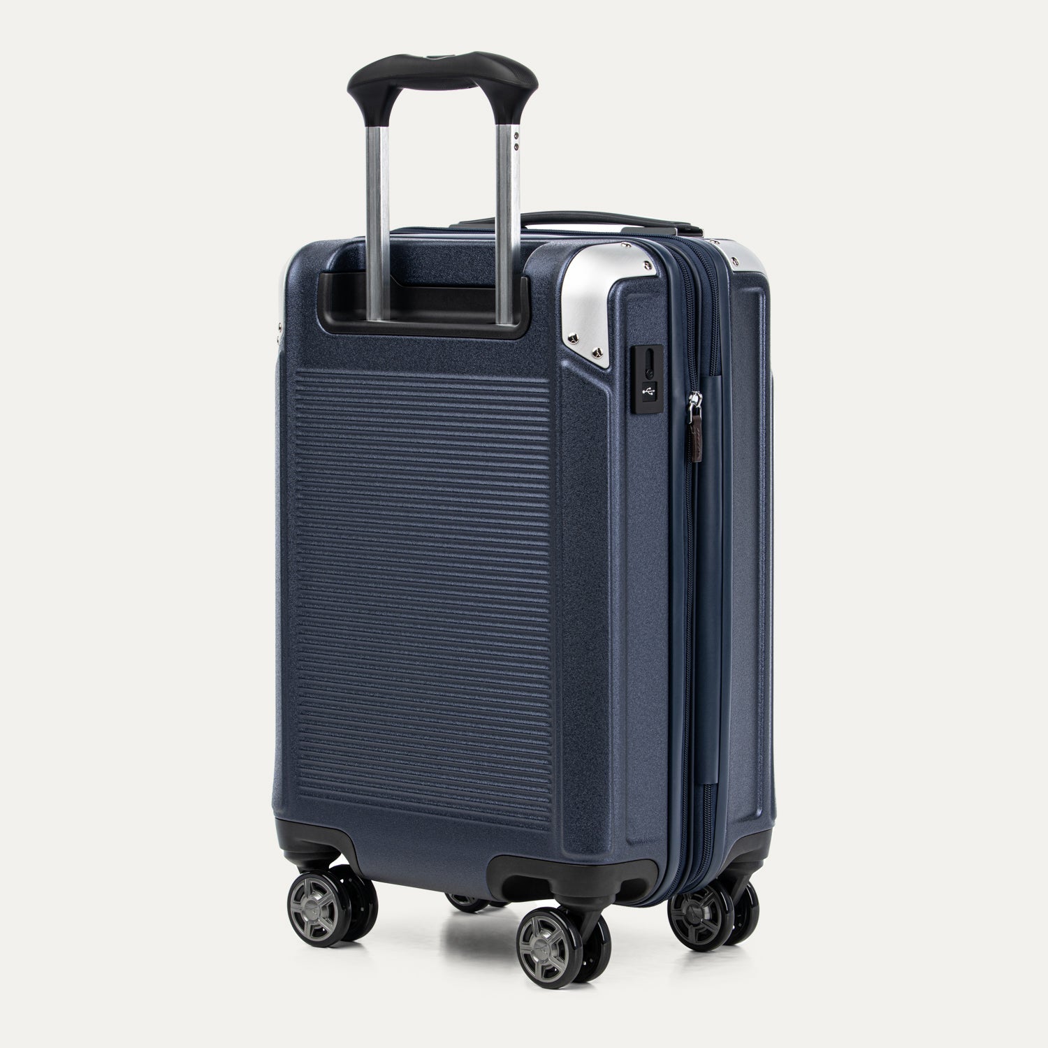 Navy blue suitcase with a textured surface on a white background