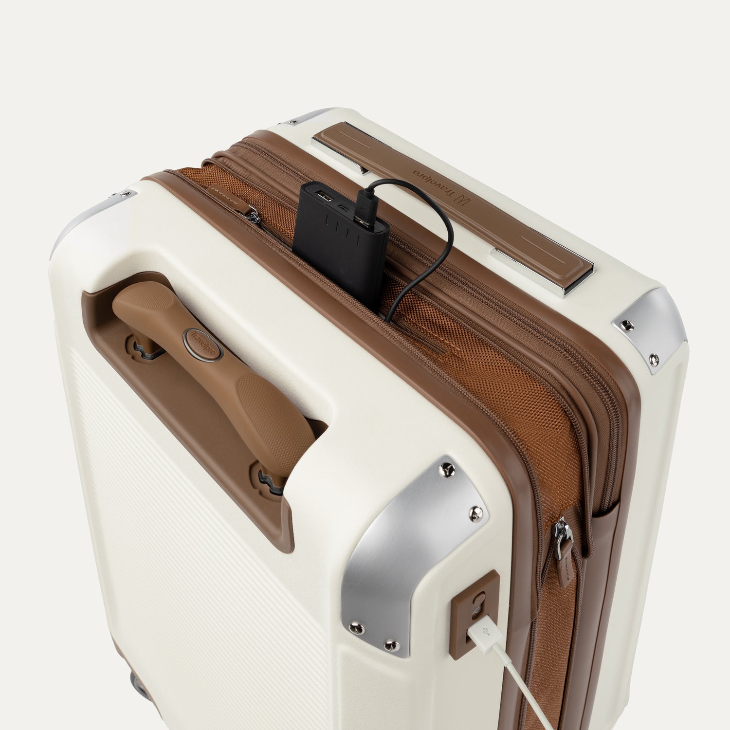 Top view of Travelpro Platinum Elite Hardside Spinner in Cream White, showing USB Charging Port and built-in battery pocket.
