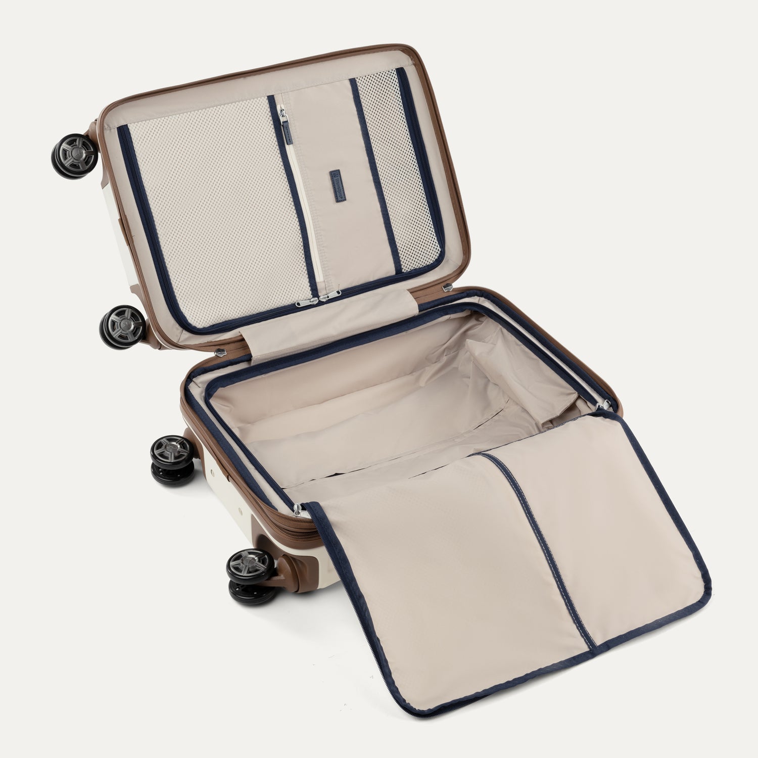 ChatGPT said:
Interior view of Travelpro Platinum Elite Hardside Spinner in Cream White, featuring zippered divider panel and mesh organizational pockets.