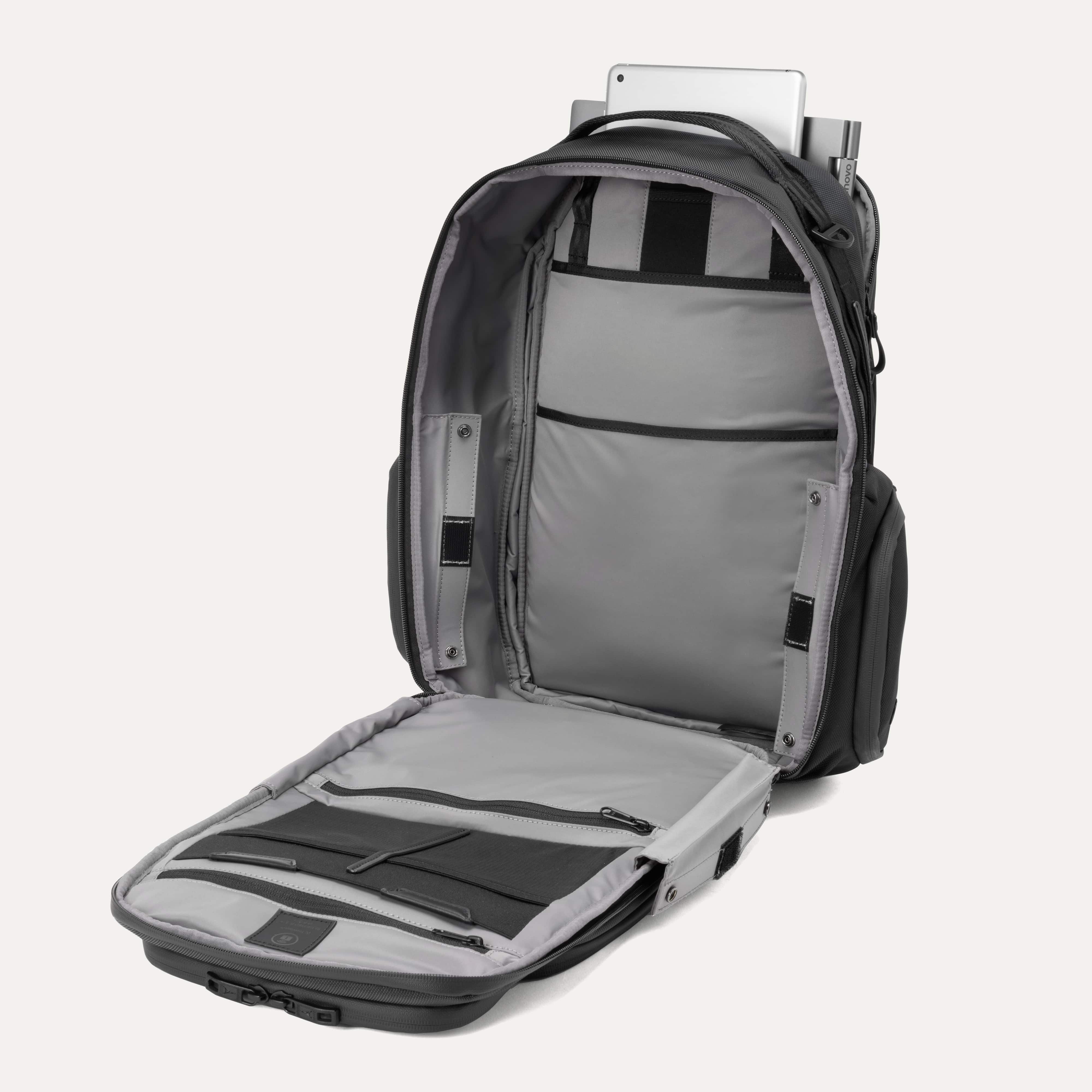 Gray backpack with open compartments on a white background