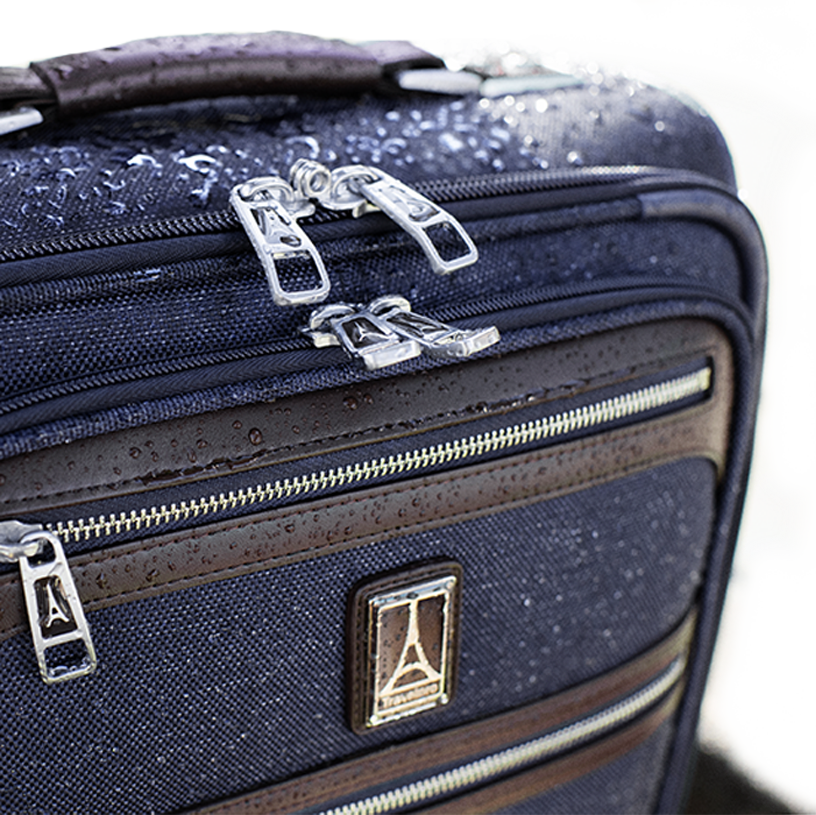 Travelpro softside suitcase with water droplets