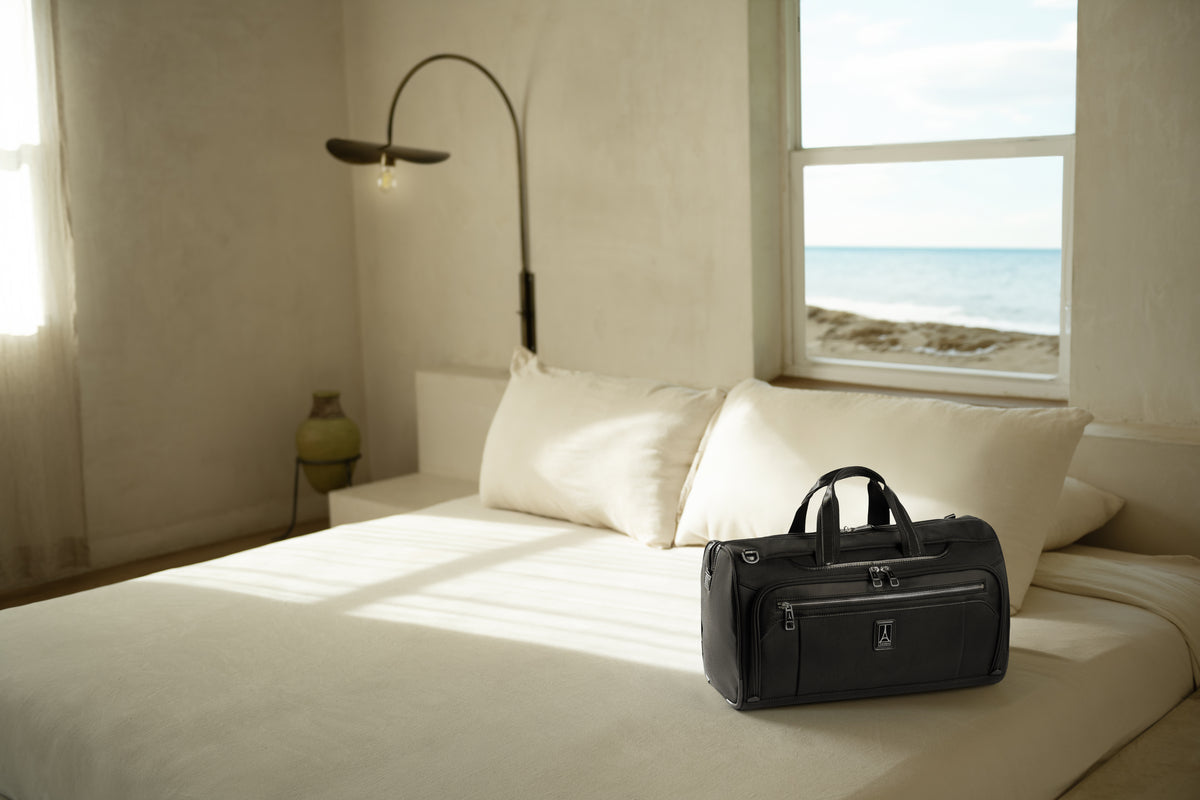 Man holding a duffel bag