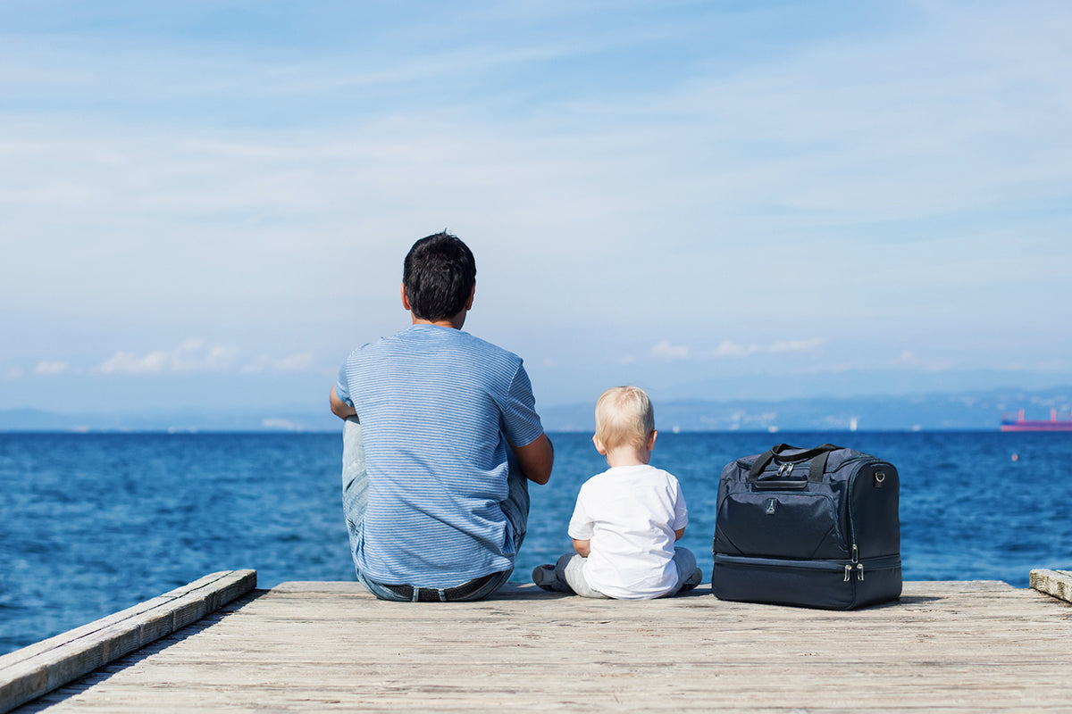 Father and infant traveling together.