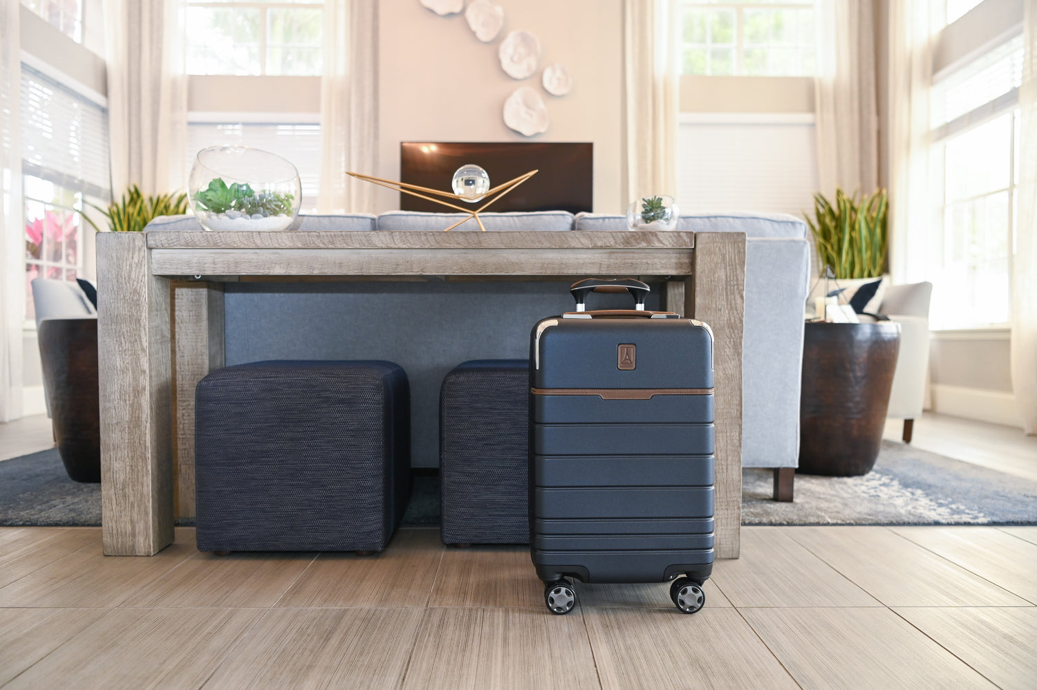 Travelpro carry on spinner suitcase in living room