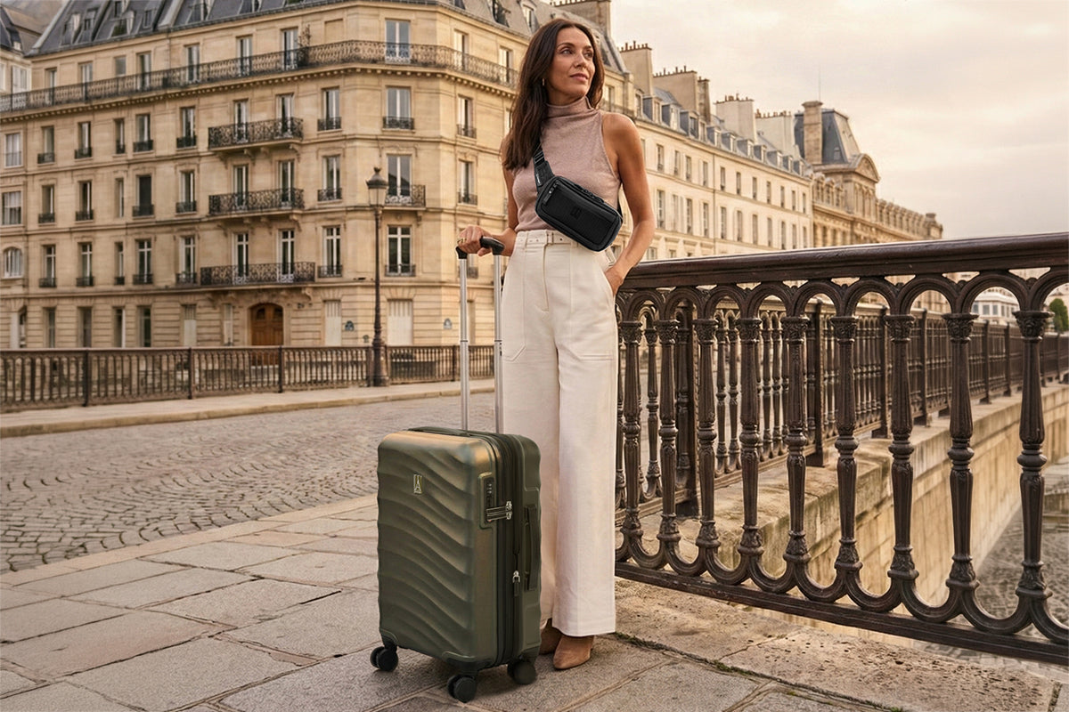 Woman traveling through a European city with Travelpro Maxlite Air V2 luggage