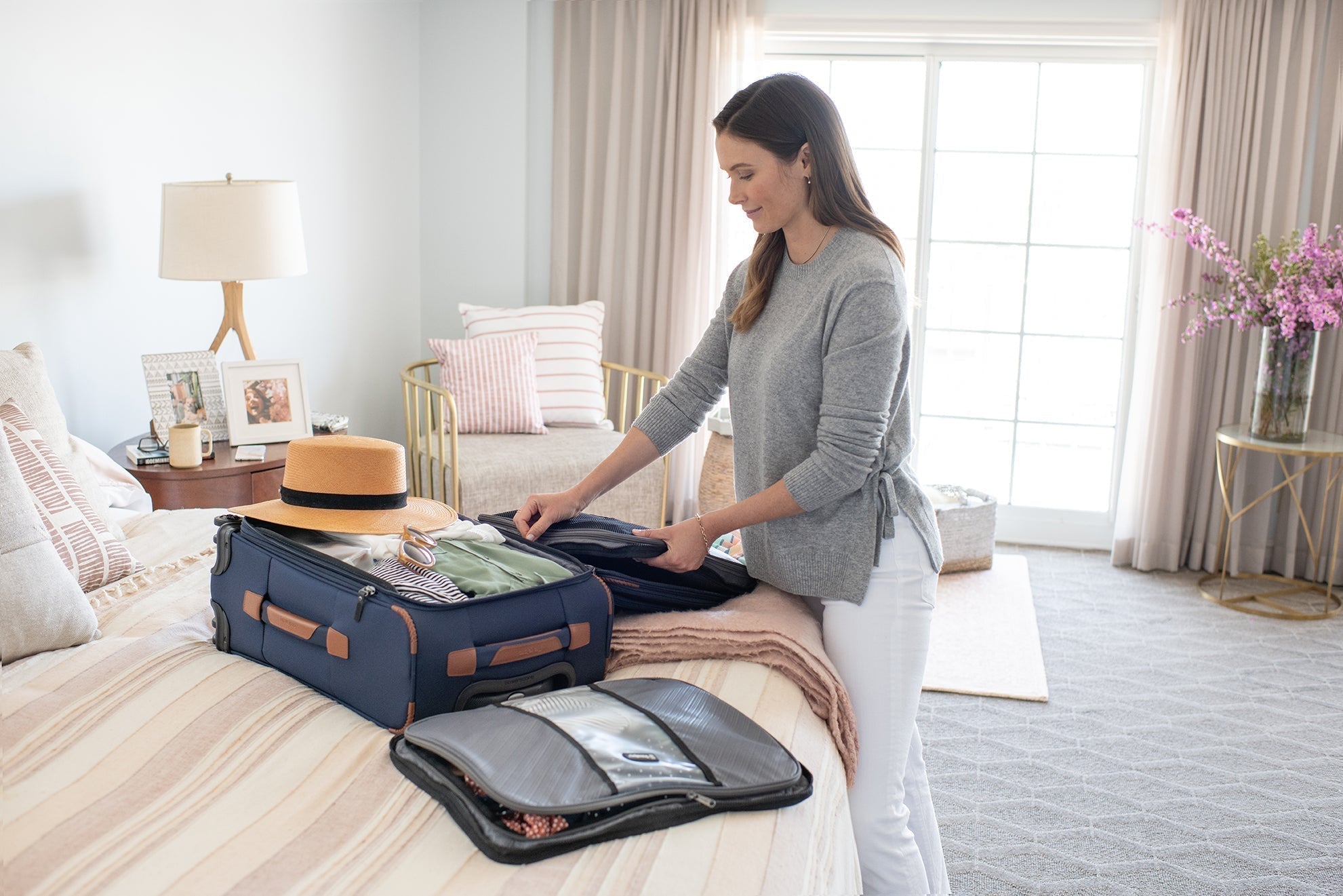 Woman packing at home