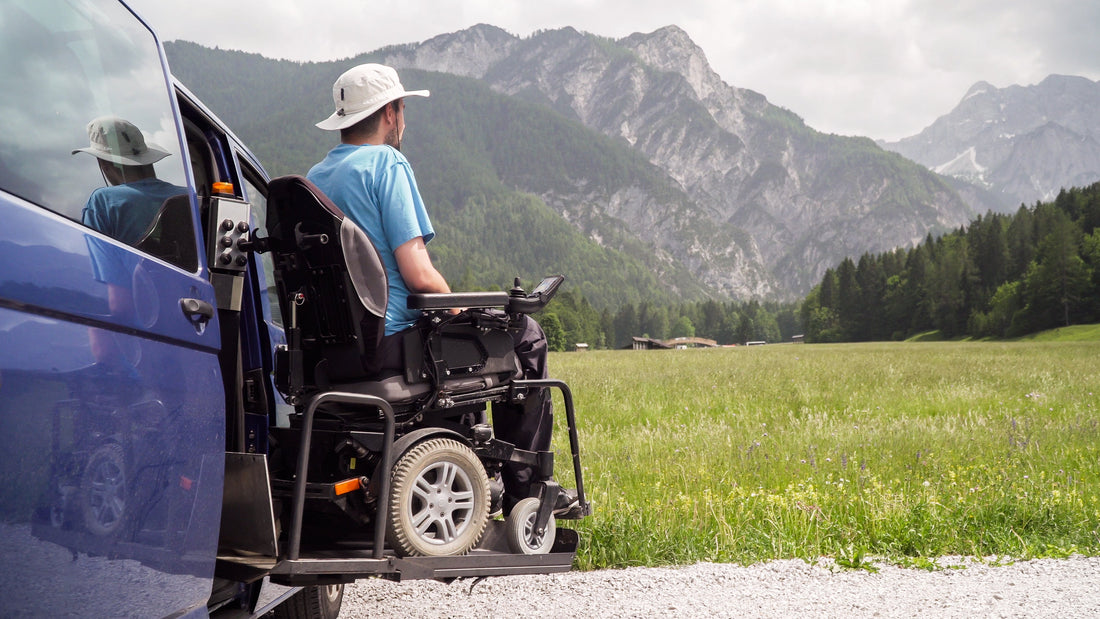 Man on a car wheel chair ramp