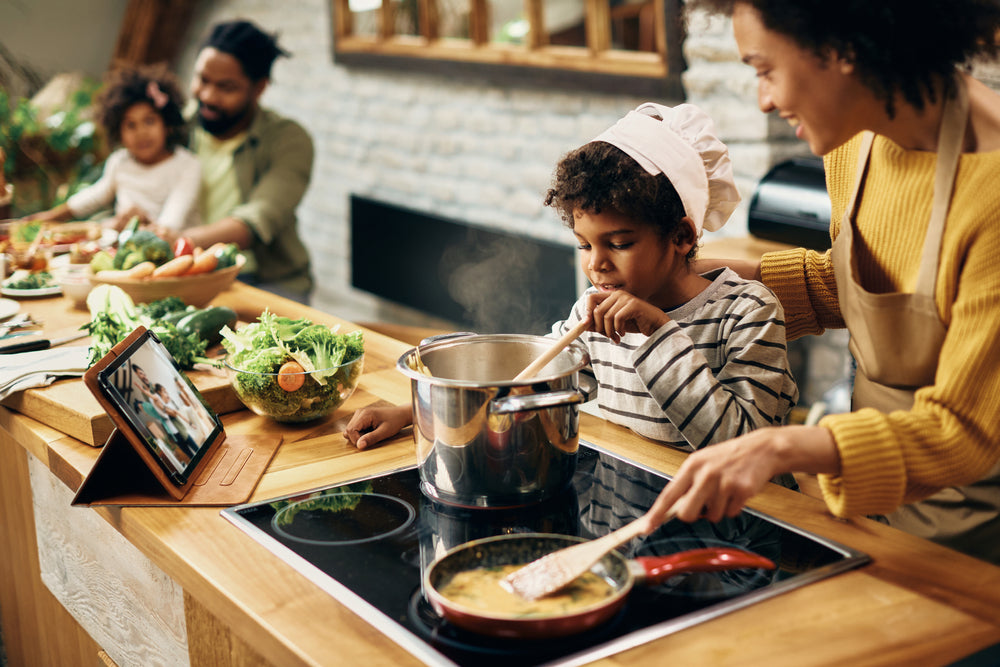 Family cooking in a kitchen together