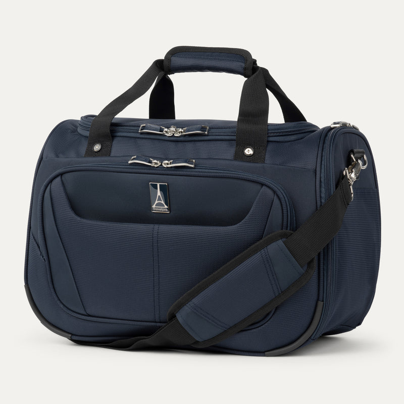 front view of the midnight blue travelpro maxlite 5 soft tote showing the padded shoulder strap, top carry handles, and the front zippered pocket with travelpro logo.
