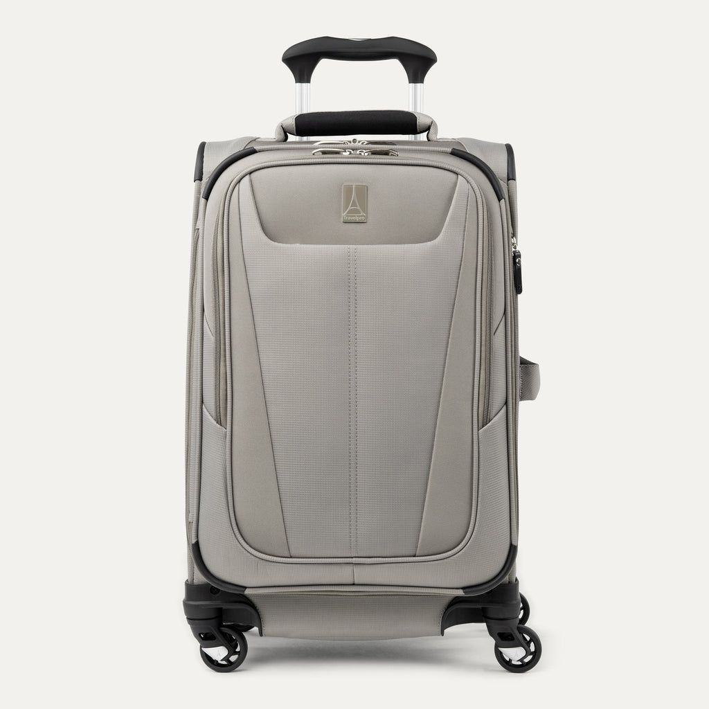 **Alt text:** Maxlite® 5 Carry-On Spinner in gray, featuring a lightweight softside design with a front zip pocket, four 360° spinner wheels, and an adjustable telescoping handle.
