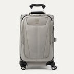 **Alt text:** Maxlite® 5 Carry-On Spinner in gray, featuring a lightweight softside design with a front zip pocket, four 360° spinner wheels, and an adjustable telescoping handle.
