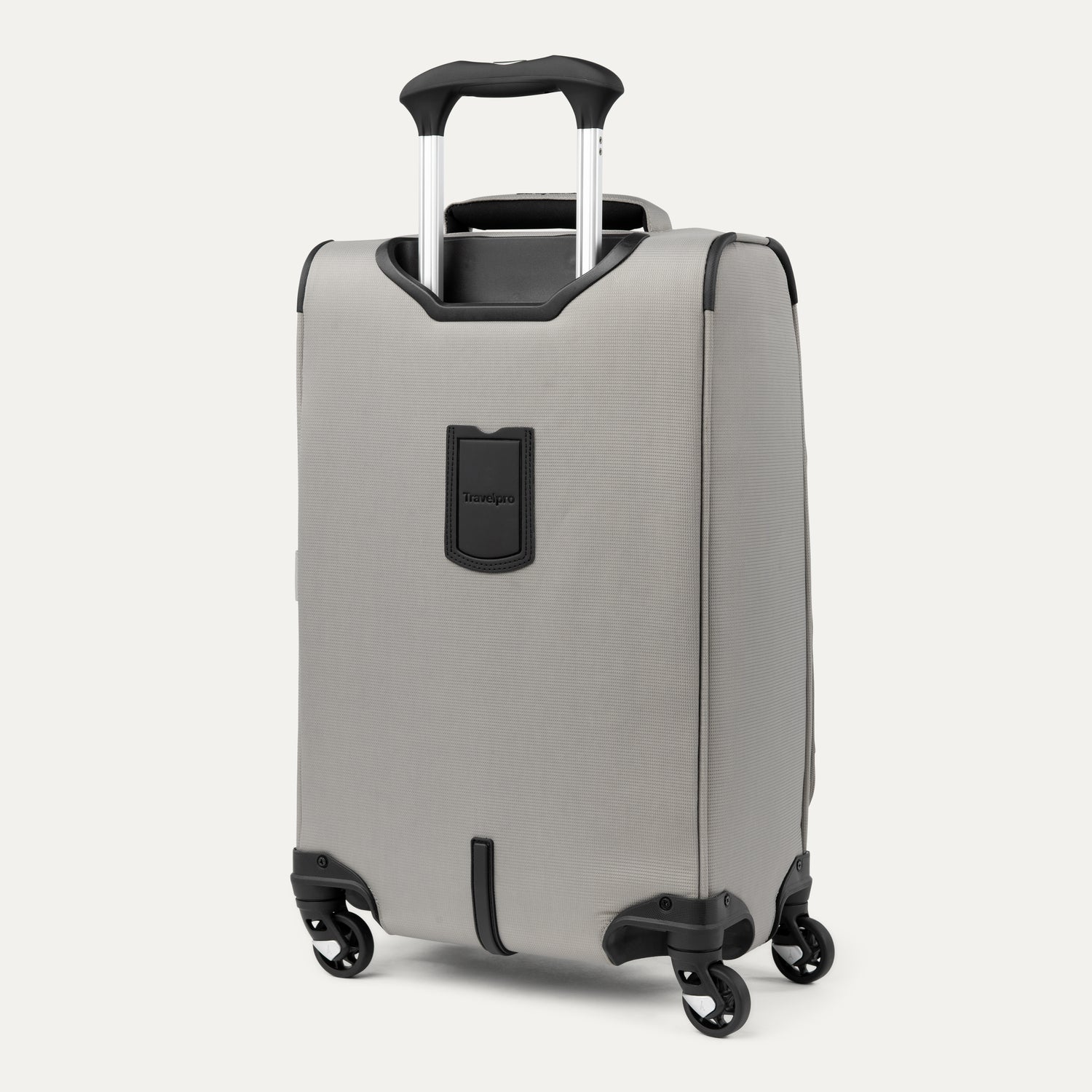 Rear view of Maxlite® 5 Carry-On Spinner in gray, featuring the telescoping handle, protective corner guards, and four spinner wheels for easy mobility.
