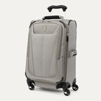 Slanted front view of Maxlite® 5 Carry-On Spinner in gray, featuring a front zippered pocket, four 360° spinner wheels, a side handle, and a lightweight softside construction.
