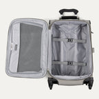 Interior view of the Maxlite® 5 Carry-On Spinner in gray, featuring a spacious main compartment with adjustable tie-down straps and a zippered mesh pocket on the lid for organized packing.
