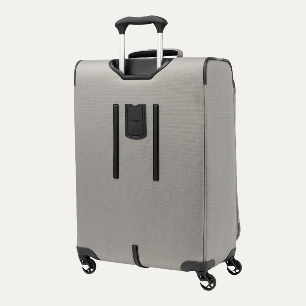 Rear view of the medium size Maxlite® 5 Expandable Spinner in gray, showing the retractable handle, back panel design, and four spinner wheels.
