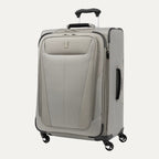 Slanted front view of the medium size Maxlite® 5 Expandable Spinner in gray, showcasing its sleek design, side carry handle, and four spinner wheels