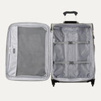 Interior view of gray Maxlite 5 Medium Expandable Spinner suitcase, showing open main compartment with adjustable tie-down straps on one side and a full-length zippered mesh pocket on the lid.