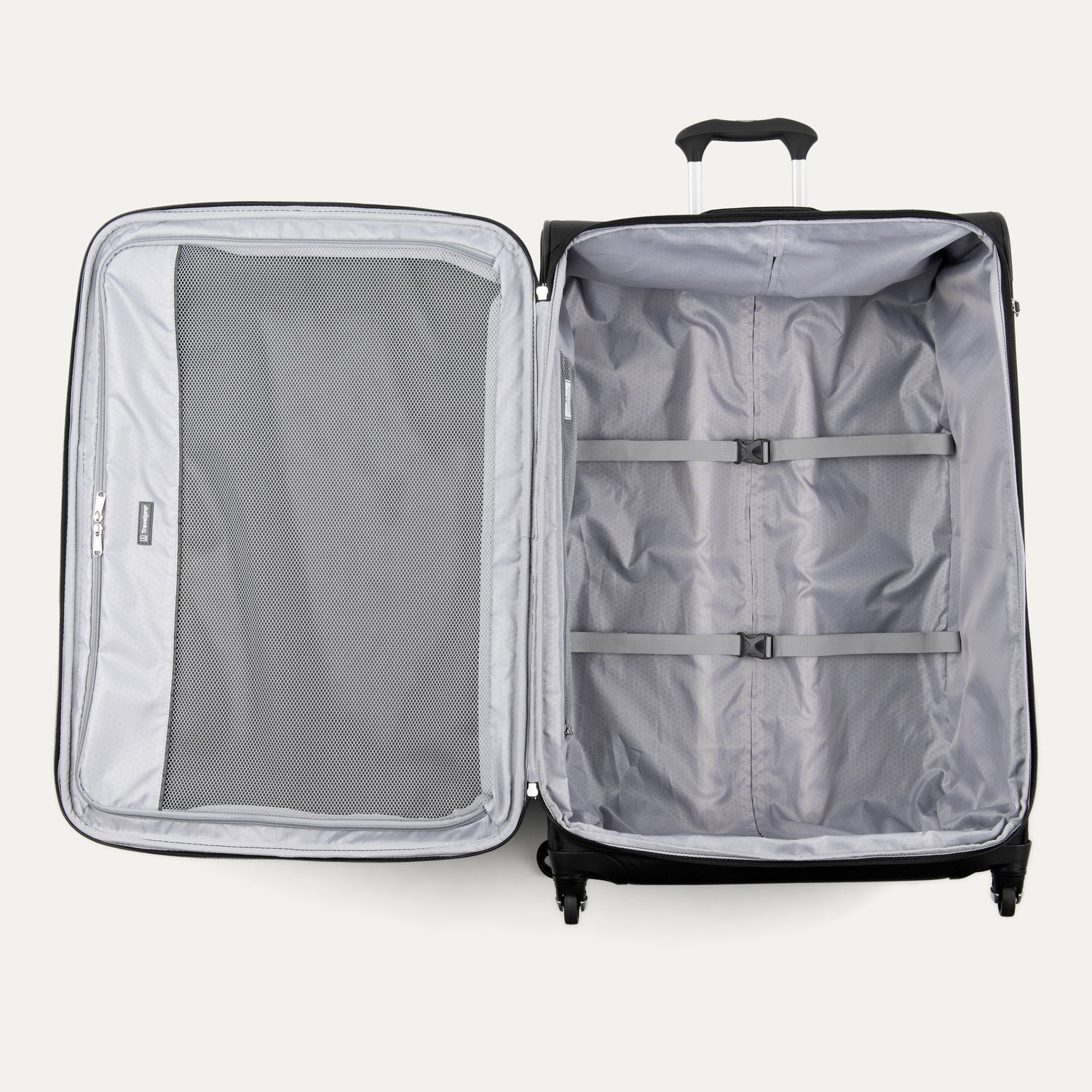 Open suitcase with interior compartments on a white background
